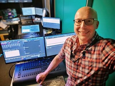 Lighting Director Adrian Turpin with Hog 4 Lighting Desk in Studio Lighting Gallery